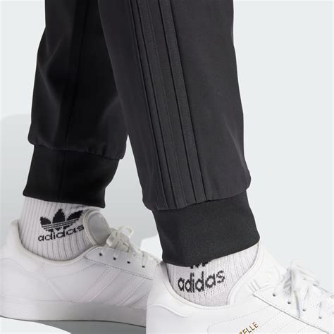 adidas sst trainingspak lichtblauw|adidas bonded track pants.